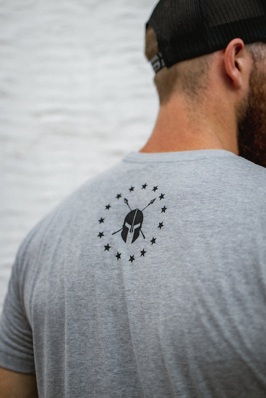 PEOPLE WILL TALK MENS DARK HEATHER GREY TEE