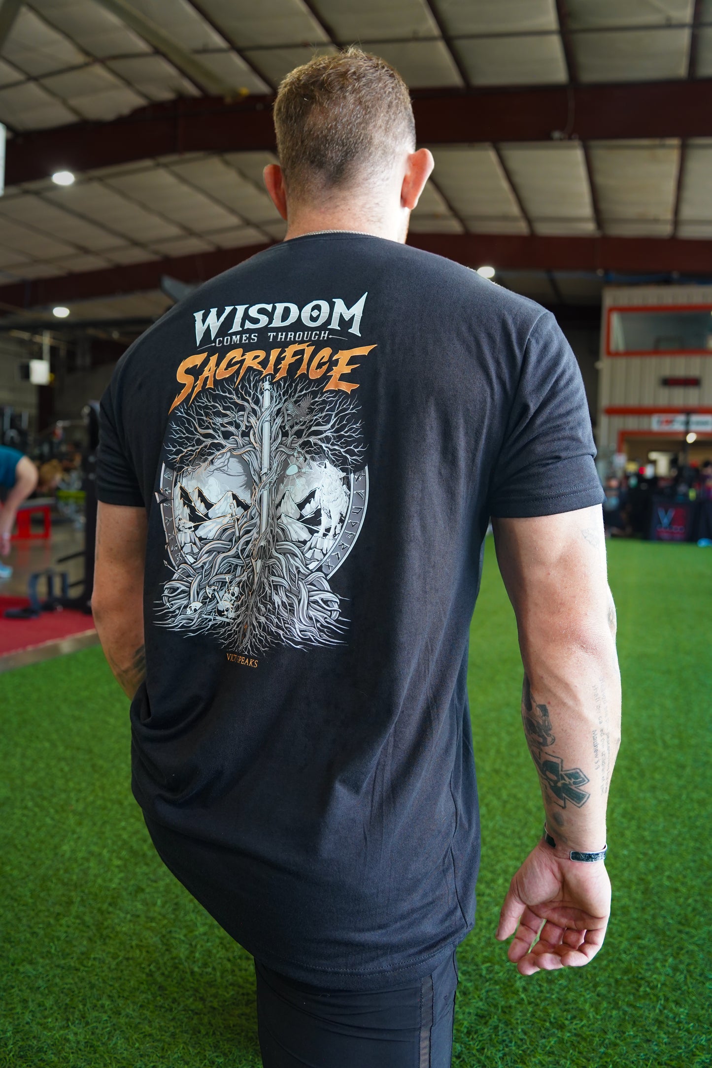 WISDOM THROUGH SACRIFICE TEE